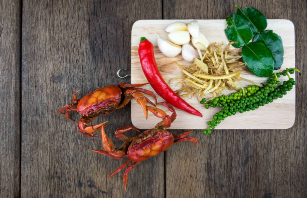istock Field crab cooking ingredients on old wooden background 854326342