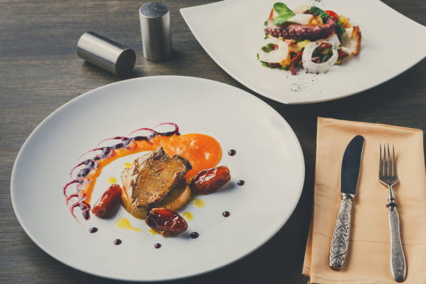 istock Roasted goose liver with date fruit and apple 854328926