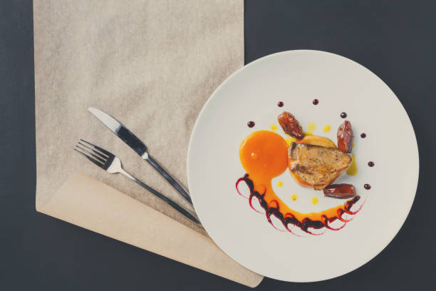 istock Roasted goose liver with date fruit and apple 854329026