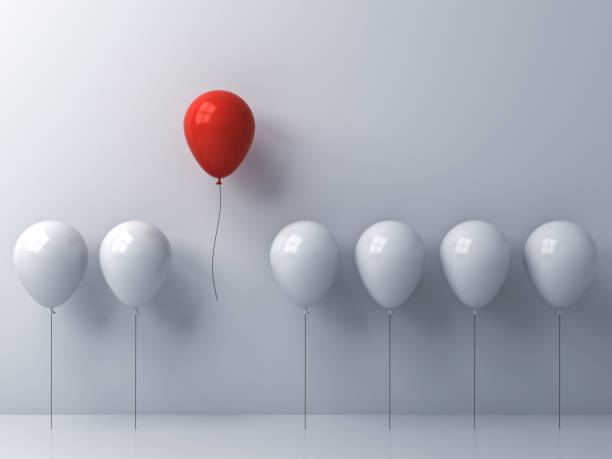 istock Stand out from the crowd and different concept , One red balloon flying away from other white balloons on white wall background with window reflections and shadows . 3D rendering 854329164