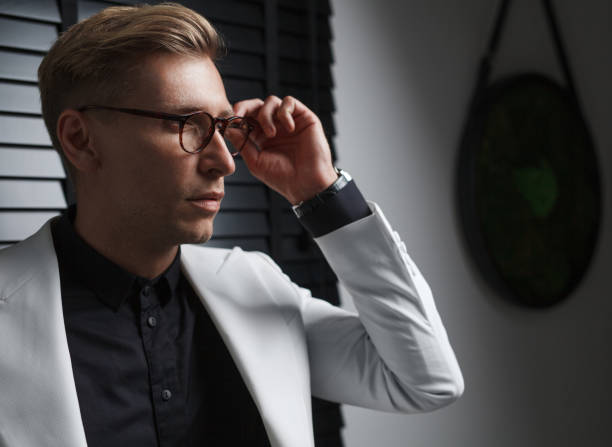 istock Fashionable man in glasses and suit 854330362