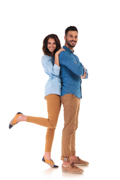 istock oman leaning on her man and holding one leg up 854330634