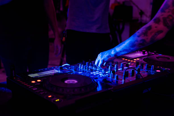 istock Hand on a sound mixer in a party 854336846