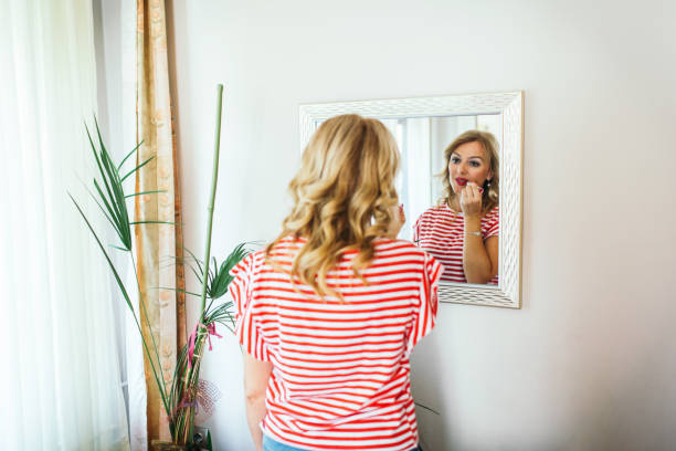 istock Mother and daughter are getting dressed to go out 854345114