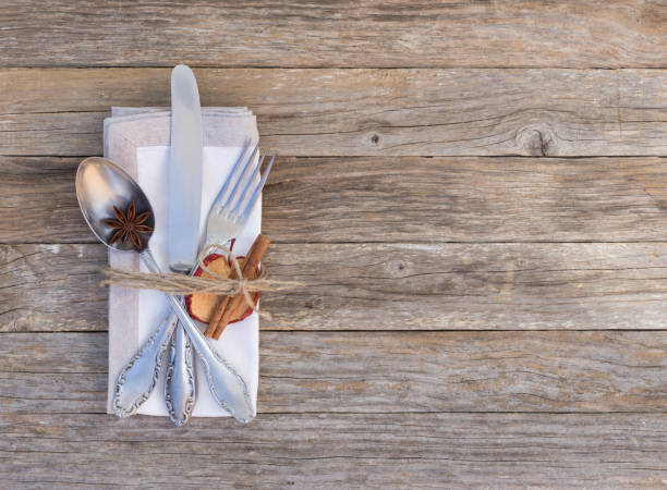 istock Silver cutlery place setting with spices at Christmas 854345844