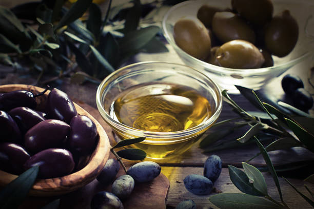 istock Olive oil and olives - retro styled 854345984