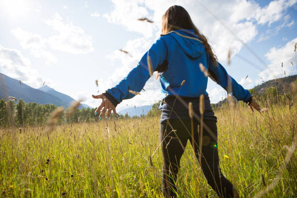 A portrait of a beautiful Canadian First nation woman in the field
