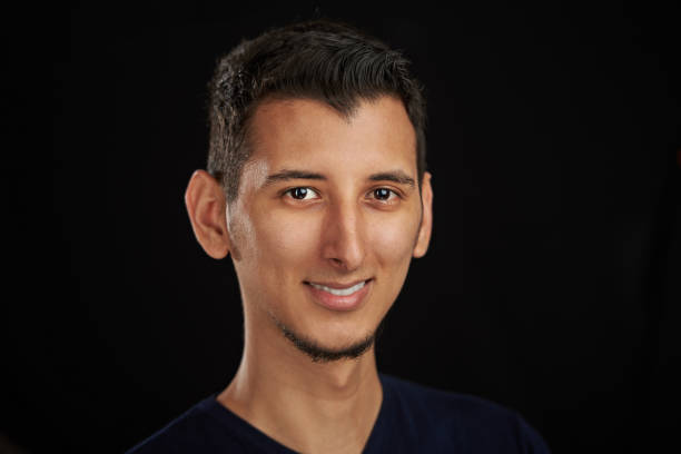 istock Portrait of smiling young man 854349294