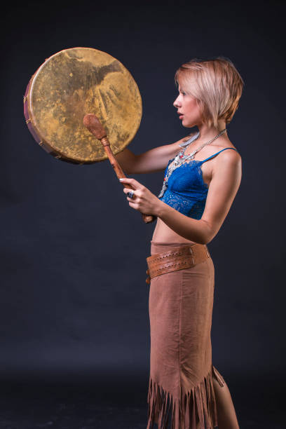 istock Modern Tribal Gypsy girl style playing drum 854358600