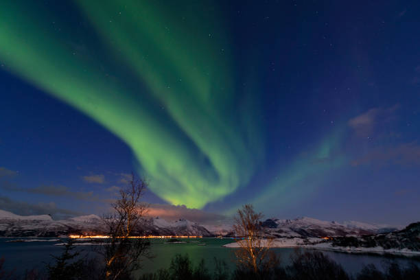 istock Aurora Northern Polar light in night sky over Northern Norway 854359622