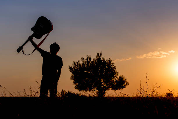 istock Silhouette of a Musician 854361970