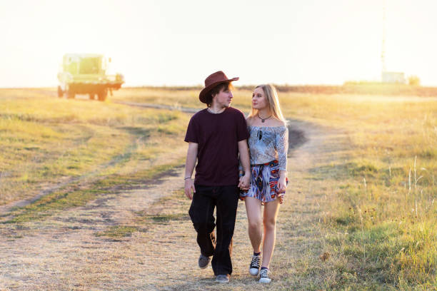 istock Teenage couple walking along the path 854362350