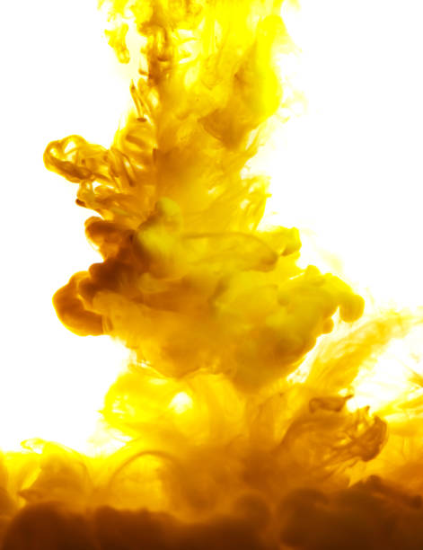 istock yellow ink in water isolated on white background 854363330
