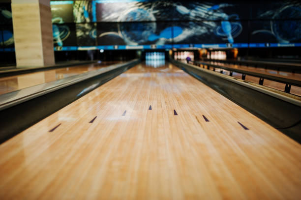 Close up of alley at bowling club. Close up of alley at bowling club. bowling alley stock pictures, royalty-free photos & images