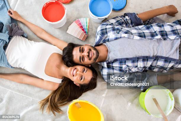Young Couple Ready For Renovation Stock Photo - Download Image Now - Adult, Adults Only, Apartment