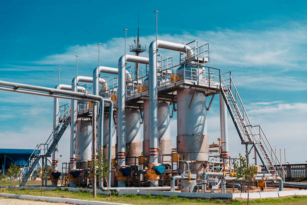 gas station with pipeline and storage tanks - water valve oil gas imagens e fotografias de stock