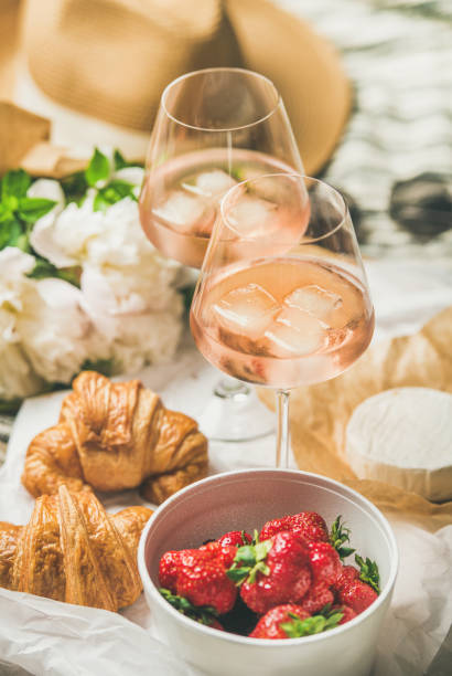 istock French style romantic summer picnic setting with rose wine 854369896