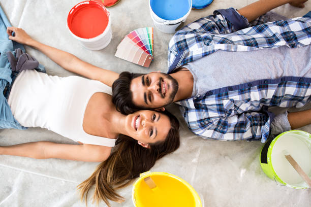 istock Happy young couple renovation new home 854370176