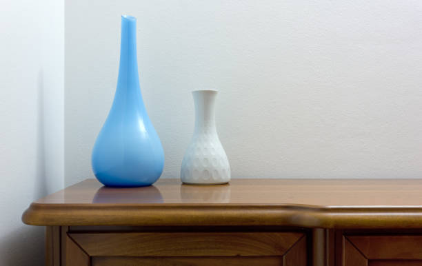 istock Two Elegant Vases on a Wooden Chest 854370290