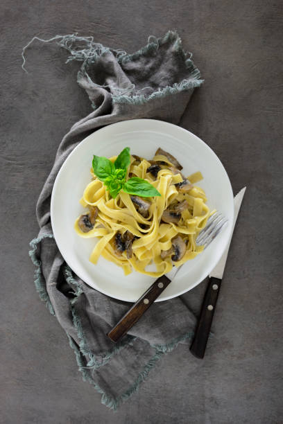 istock Tagliatelle with mushroom creamy sauce 854371618