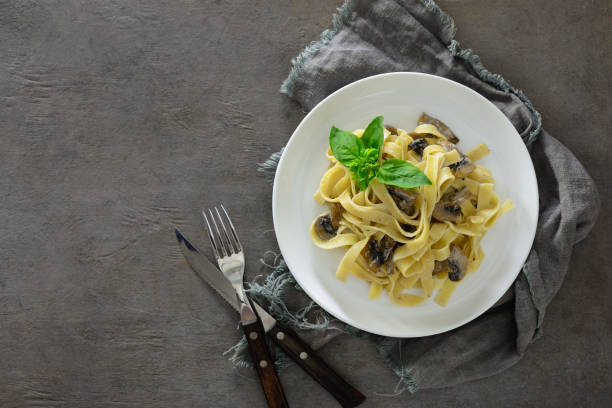 istock Tagliatelle with mushroom creamy sauce 854371620