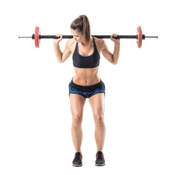 istock Bend low position of woman athlete doing shoulder press squat exercise. 854374596