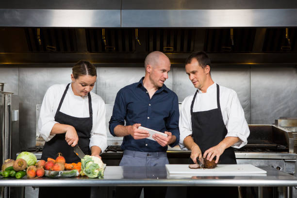 istock Restaurant manager works with his professional chef's 854375046