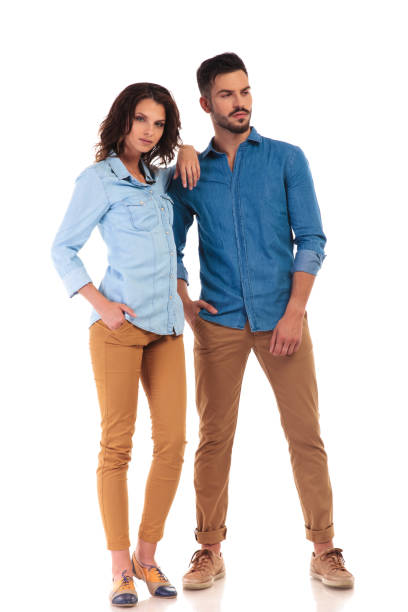 istock man looks away while woman leans on his shoulder 854377758