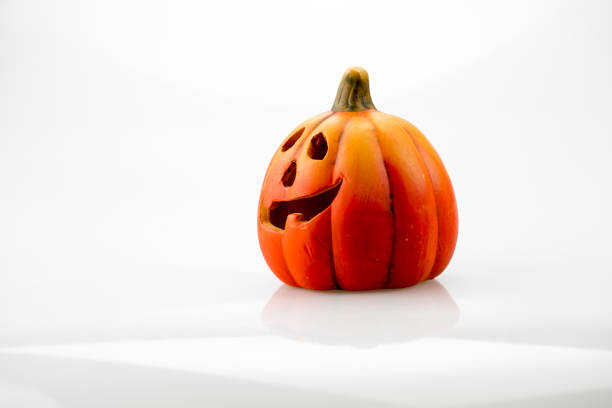 istock Vintage clay pumpkin isolated on white background. 854381904
