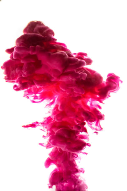 istock red ink in water isolated on white background 854385368