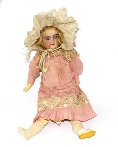 istock Toy Doll Dolly Baby Broken on a Plain Background 854385952