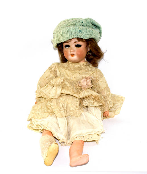 istock Toy Doll Dolly Baby Broken on a Plain Background 854386110