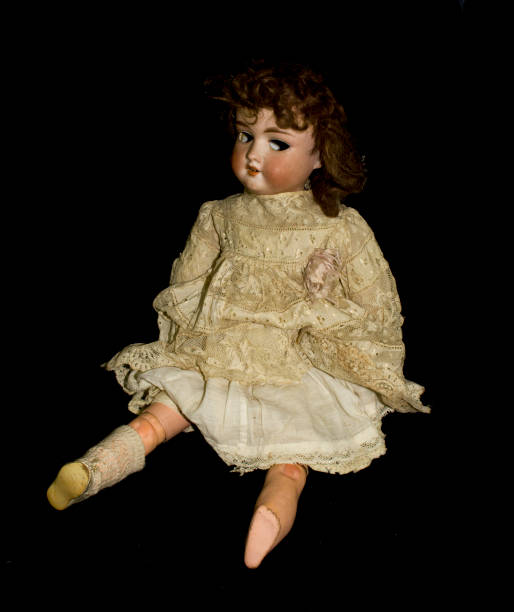 istock Toy Doll Dolly Baby Broken on a Plain Background 854388878