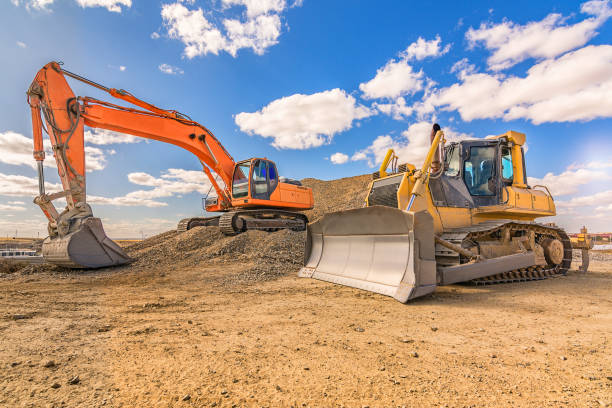 Heavy machinery in repair works of a motorway Heavy machinery in repair works of a motorway in Spain construction equipment stock pictures, royalty-free photos & images