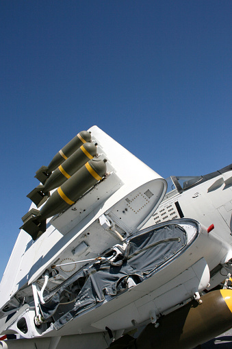 AIM-120  Advanced Medium-Range Air-to-Air Missile AMRAAM and AIM-9 Sidewinder x Air-to-Air Missile under the wing of a F16 fighting falcon united states air force at Leeuwarden air base may 2019 the netherlands