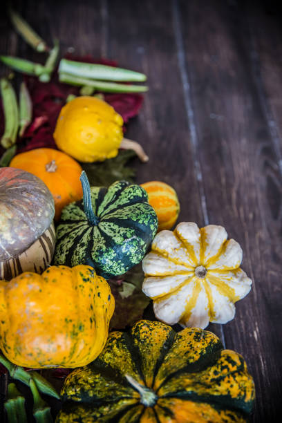 istock Colorful pumpkins decoration on wooden table 854404988