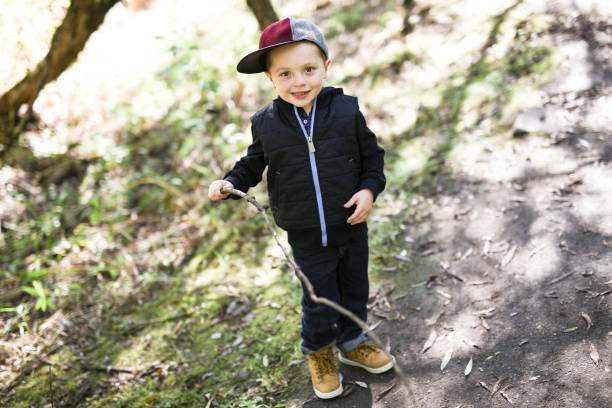istock cute child in nature 854405336