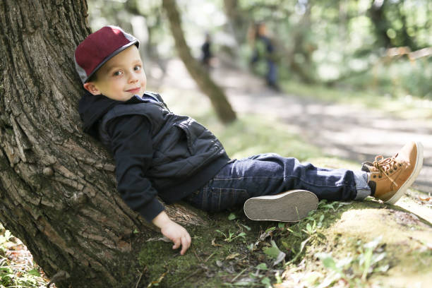 istock cute child in nature 854405632