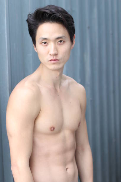 istock Sensuous Asian man shirtless close up 854408950