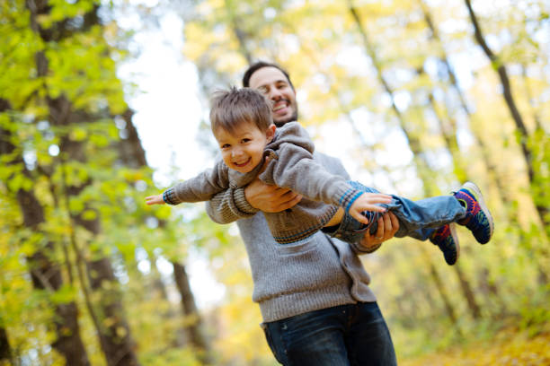 istock nature with dad in forest autumn 854410970