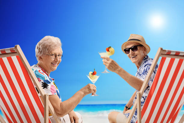 istock Elderly tourists with cocktails 854411220