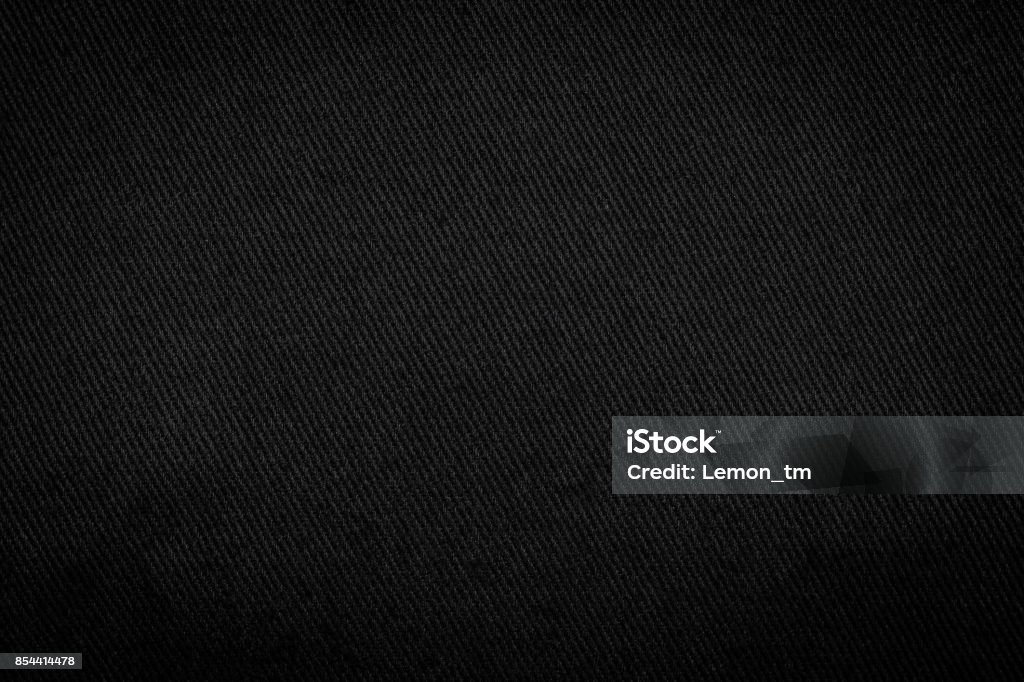 Black fabric texture background. Detail of dark textile. Black Color Stock Photo