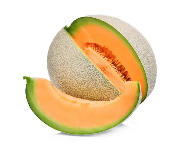 Photo of slice of japanese melons, green melon or cantaloupe melon with seeds isolated on white background