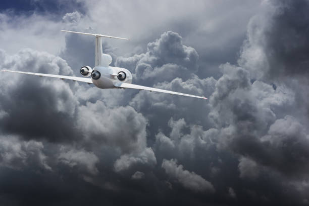 Civil airliner head to heavy thunderstorm clouds