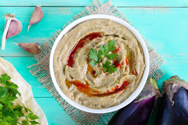 istock Baba ganush - hummus from eggplant with seasoning, parsley. Eastern cuisine. 854415014