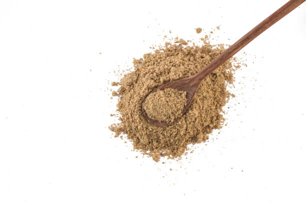 istock Brown Coconut Flour into a spoon 854419650