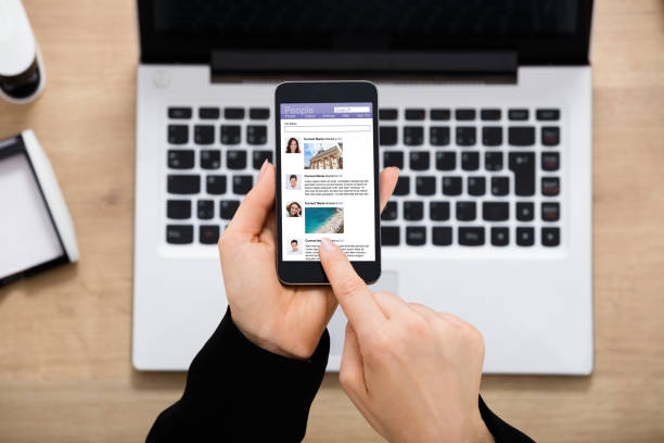 istock Businesswoman Using Social Network On Mobilephone 854422960