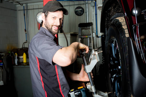 istock Mechanic working on car in his shop 854423294