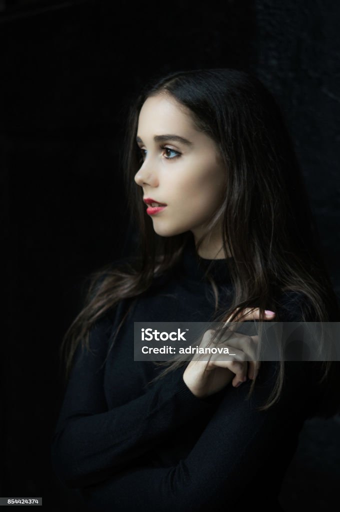 Portrait of gothic pretty girl Portrait of gothic pretty girl black dark background Vampire Stock Photo