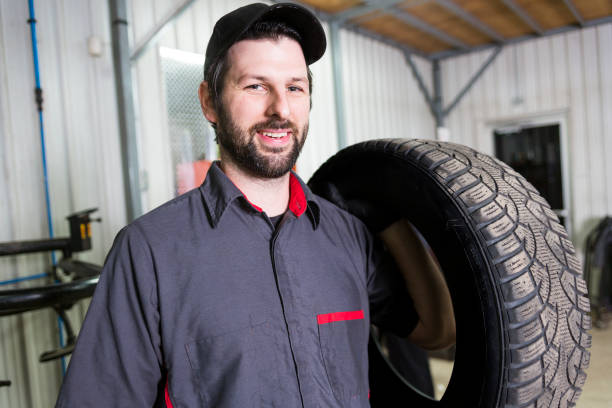 istock Mechanic working on car in his shop 854430684